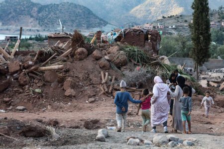 People walk among the debris in the town of Ouirgane, south of Marrakesh, after the powerful earthquake that hit Morocco late Friday. Photo: Khaled Nasraoui/dpa