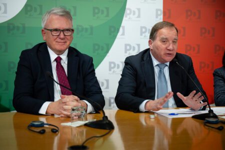 File photo: European Commissioner for Jobs and Social Rights Nicolas Schmit (left) and PES President Stefan Löfven speak at a PES event in Rome, March 2024